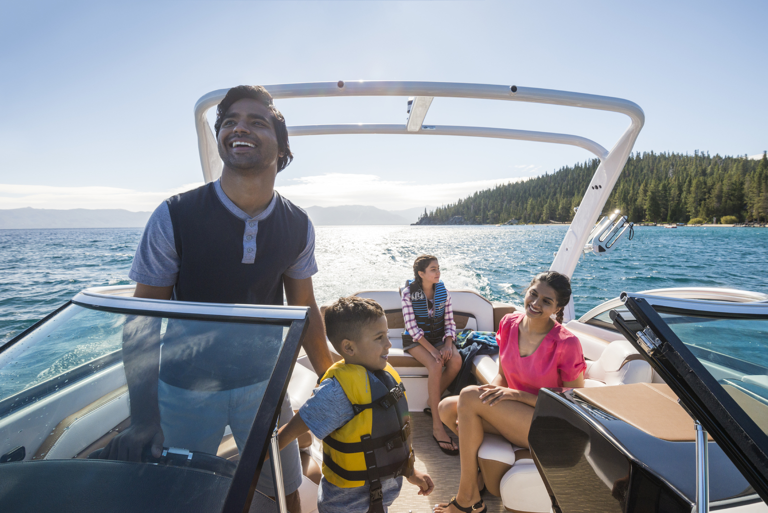People enjoying various activities in a picturesque view of Lake Tahoe