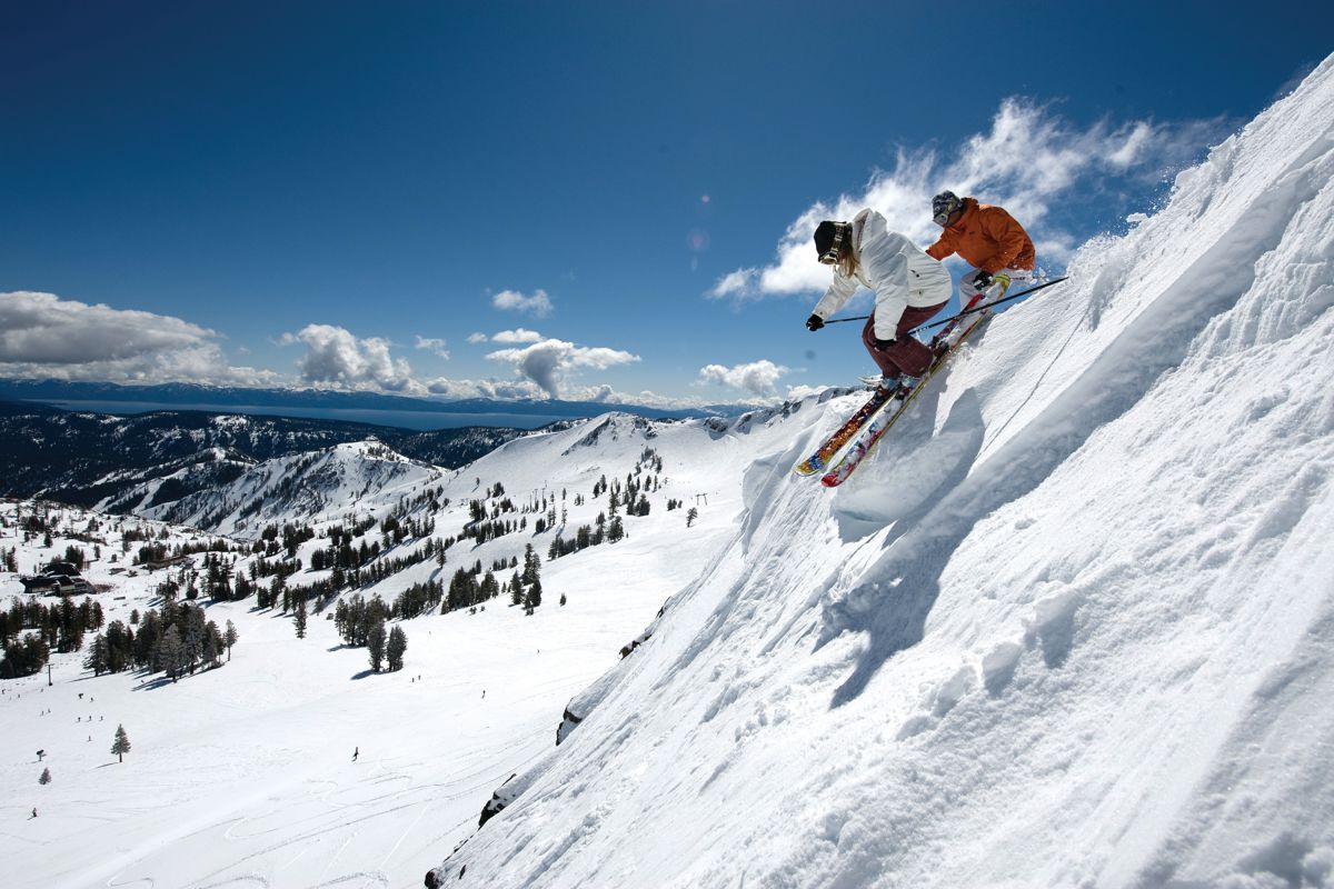 Skiers enjoying the slopes at Squaw Valley Alpine Meadows in Lake Tahoe